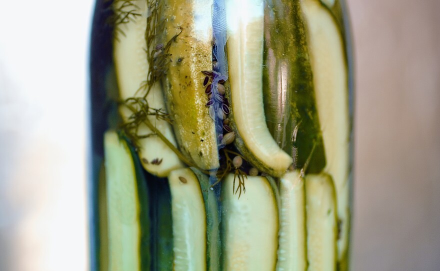 These snappy dill pickles were once Kirby cucumbers. The canning liquid is made with vinegar, fennel and coriander seeds that give them their distinct tart flavor.
