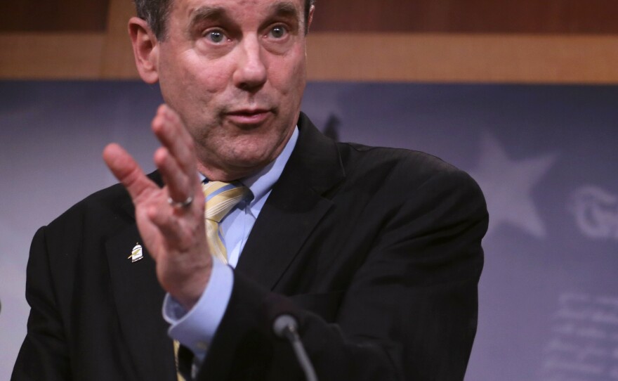 Sen. Sherrod Brown, seen here speaking about the trade bill Tuesday, told NPR "I bet that none of my colleagues have read the entire document. I would bet that most of them haven't even spent a couple hours looking at it." Brown acknowledged he has yet to read every single page of the trade agreement.