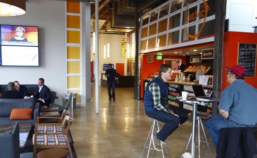 The lobby entrance to Galvanize is a bar and a coffee shop.