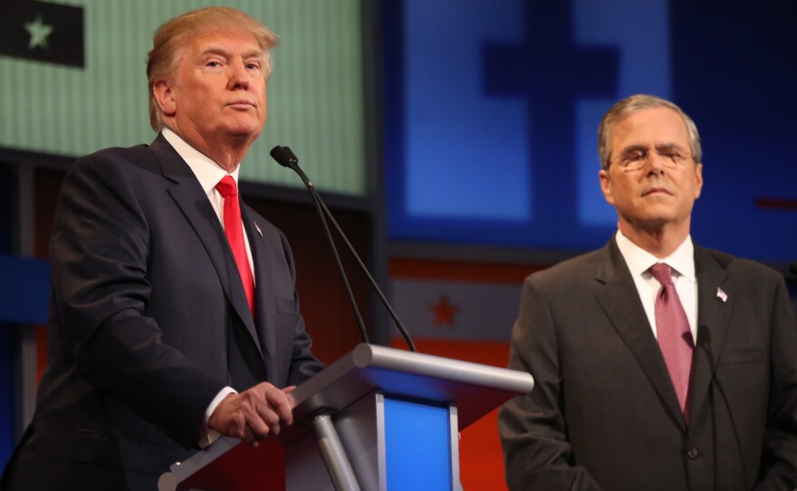 Donald Trump (left) and Jeb Bush on stage at the first Republican presidential debate in August.
