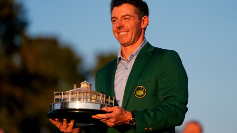 Rory McIlroy, of Northern Ireland, holds the trophy after winning the Masters golf tournament at the Augusta National Golf Club, Sunday, April 12, 2026, in Augusta, Ga.