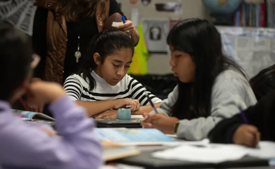 Students work on multiplication problems during a Spanish language math class at Madison Elementary School in Madera on Oct. 30, 2024.