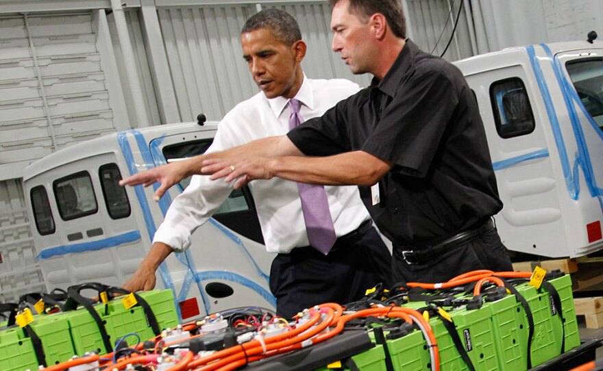 President Obama looks at rechargeable car batteries with Dennis Hartman during the president's tour of Smith Electric Vehicles in Kansas City, Mo., on July 8.