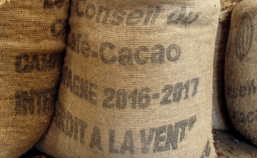 Sacks of cocoa beans at a warehouse in San Pedro. Coffee and Cocoa Council is the government regulator of the Ivory Coast's cocoa industry.