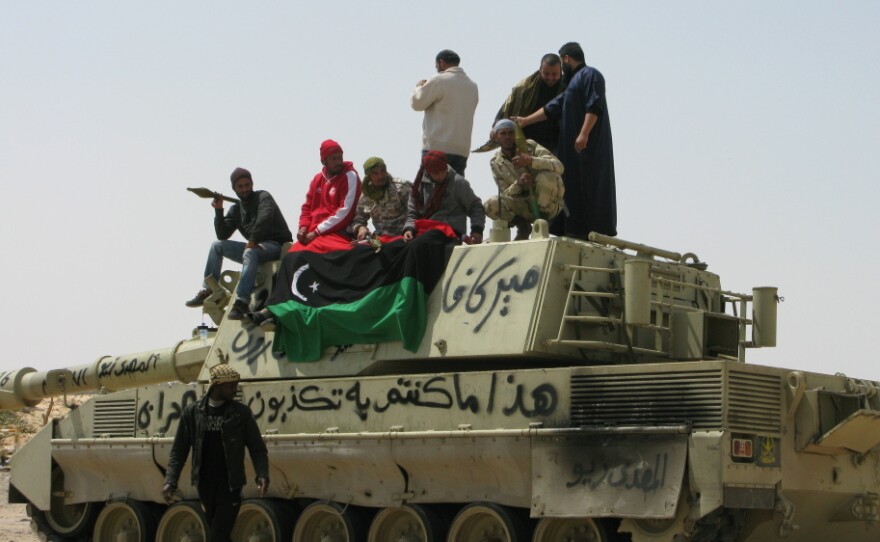 Even while some rebels celebrate their win in the city of Ajdabiya, others are already moving ahead past the city to the next battle.