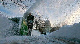 Capitol grounds worker Kevin Trodden uses a snow blower to clear side walks at the US Capitol on February 11, 2010 in Washington, DC. Washington was hit with a second snow storm in a week leaving a foot of snow and causing wide spread power outages.