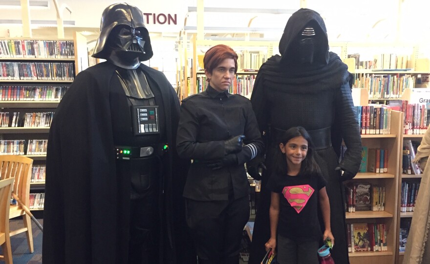 Jamie Tobitt as Vader, Lindsey Cepak as General Hux, and Shane Holly as Kylo Ren, Undated photo.