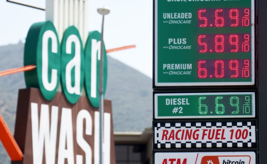 Gas prices are displayed at a station in Burbank, Calif., on April 27. Gas prices have surged along with other consumer goods, hurting pocketbooks across the country.