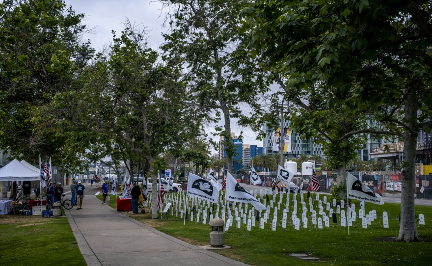 San Diego Veterans for Peace set up the “Hometown Arlington West Memorial” in front of the USS Midway Museum in downtown San Diego. The memorial is made up of grave markers, in the shape of a tombstone, with the names of the 288 Southern California service members who died in the Iraq and Afghanistan wars. Tombstone. The black markers represent those lost to suicide, May 29, 2023.<br/>