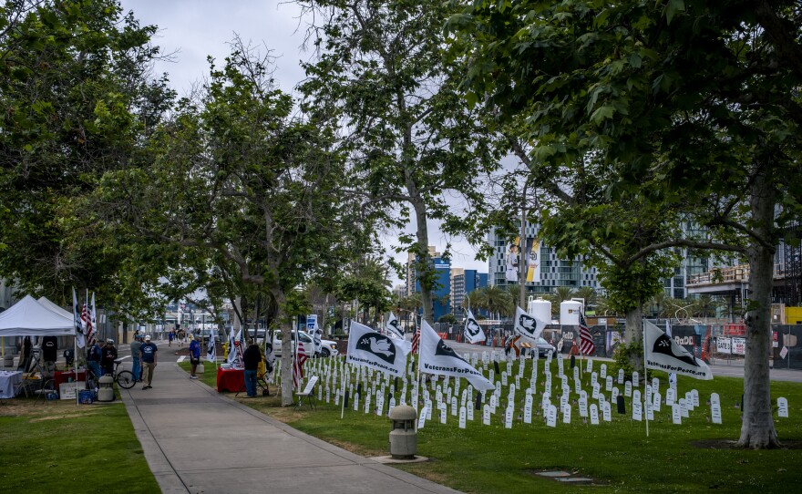 San Diego Veterans for Peace set up the “Hometown Arlington West Memorial” in front of the USS Midway Museum in downtown San Diego. The memorial is made up of grave markers, in the shape of a tombstone,&nbsp; with the names of the 288 Southern California service members who died in the Iraq and Afghanistan wars. Tombstone. The black markers represent those lost to suicide, May 29, 2023.<br/>