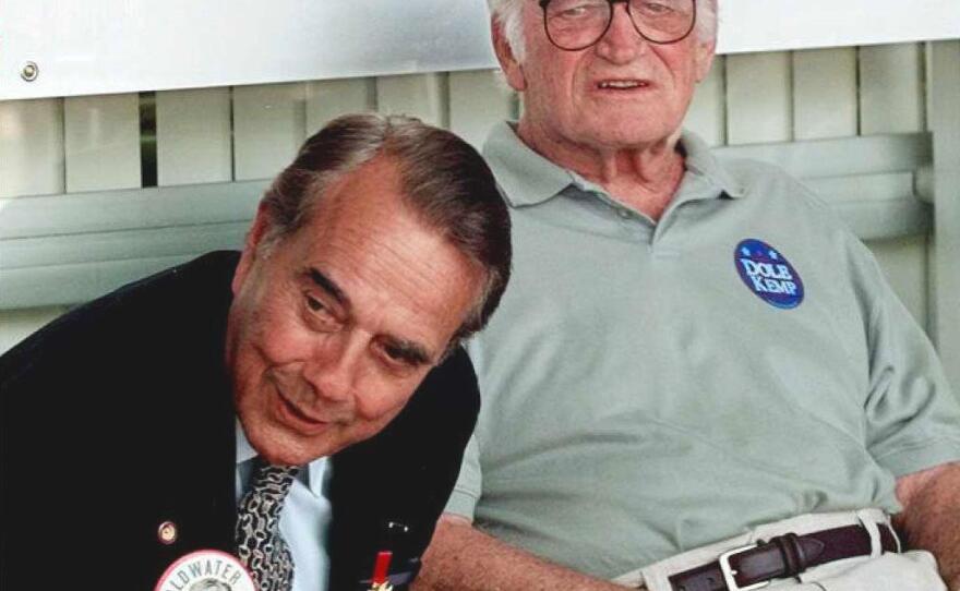 Bob Dole, then the Republican presidential candidate visits with former Sen. Barry Goldwater, on Sept. 17, 1996.