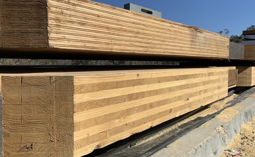 Panels of mass timber are stacked at the construction site of the NHERI Tall Wood Project test building, Oct. 26, 2022.