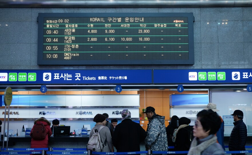 Signs for the DMZ train above ticket windows at the Yongsan Station in Seoul.