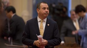 Democratic State Sen. Tony Mendoza stands on the floor of the Senate chambers in between private meetings of the Democratic caucus in Sacramento, Calif., Wednesday, Jan. 3, 2018. 