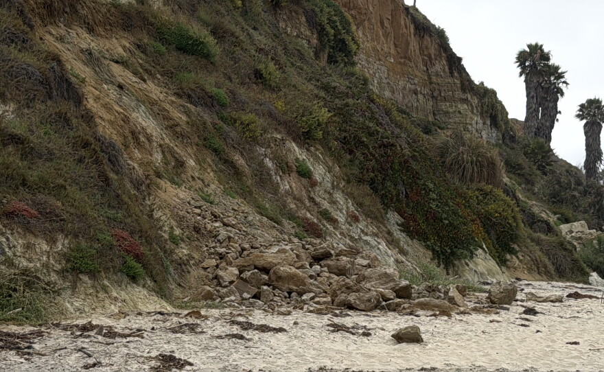Debris from a bluff collapse lays on the sand at San Elijo State Beach, July 9, 2026.