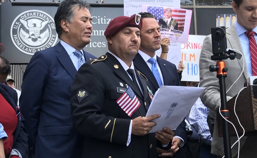 Hector Barajas holds his citizenship documents, April 13, 2018.