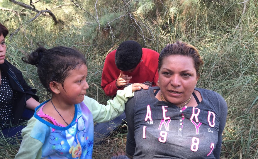 The Border Patrol apprehends a Salvadoran mother and her frightened daughter with a group of seven Central Americans down by the Rio Grande.