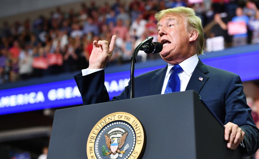 President Donald Trump speaks during a "Make America Great Again" rally at Landers Center in Southaven, Miss. on Tuesday night.