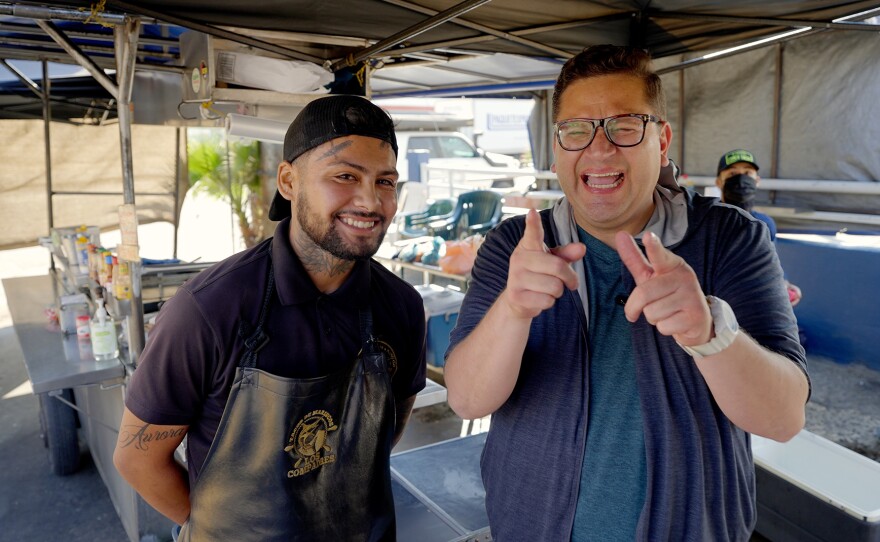 Host Jorge Meraz meets chef Jesus Lara at the Carreta Los Compadres taco stand in Tijuana.