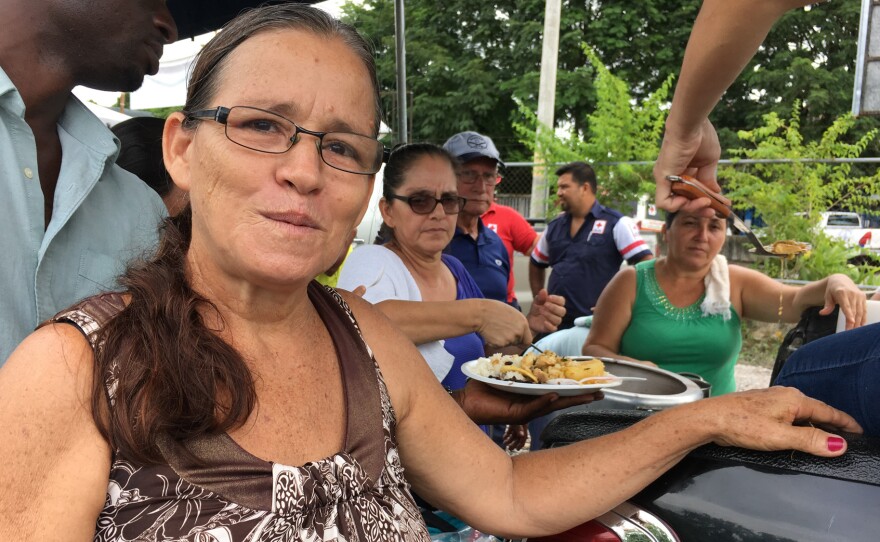 "It gives us lots of joy and happiness to cook ... for them," says Deborah Jiménez, who leads the volunteer cooking crew.