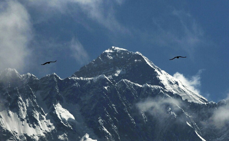 The official height of Mount Everest, seen here last year from Namche Bajar, Nepal, has been the subject of intense negotiations between Nepal and neighboring China. On Tuesday, they announced a revised number both countries have agreed upon: 8,849 meters, or about 29,032 feet.