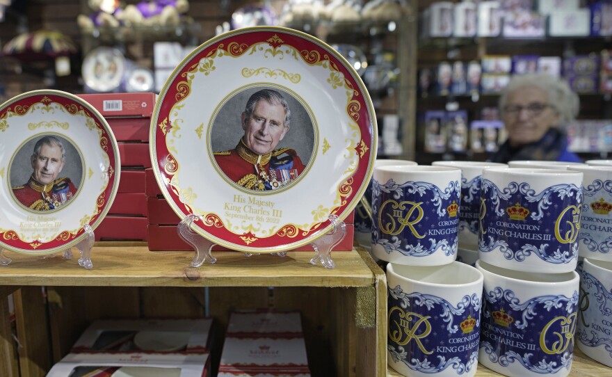Coronation plates and cups are displayed for sale in a gift shop in London on April 24.