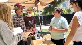 Pat Holder teaches a humanities class outdoors most afternoons during the week. Students design and construct furniture that will be sold at the end of the school year to raise money for the Gary and Jerri-Ann Jacobs High Tech High at Liberty Station, San Diego, April 13, 2022.