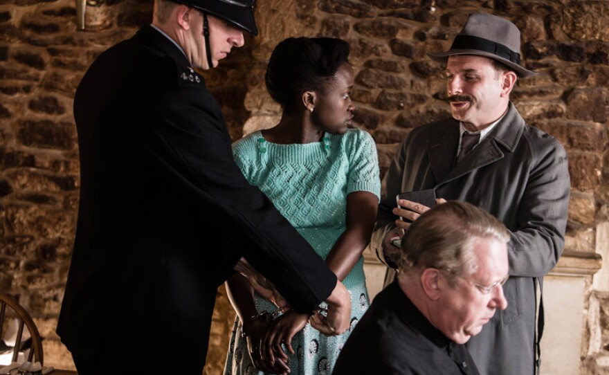 Grace Kemp (PEPTER LUNKUSE), Inspector Mallory (JACK DEAM), Father Brown (MARK WILLIAMS) in a scene from "The Tanganyika Green."