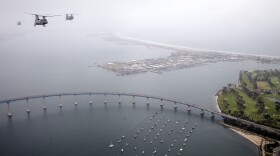 Three CH-46 "Phrog" helicopters fly over the Coronado Bridge Wednesday, May 23, 2012, in San Diego. 