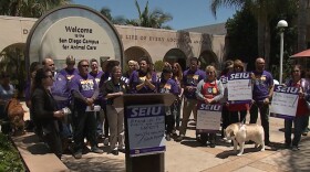 County animal services staff and volunteers rally outside the animal shelter, May 8, 2017.
