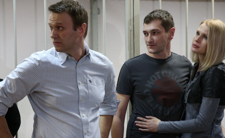 Russian opposition leader Alexei Navalny (left) and his brother Oleg Navalny appear at Moscow for sentencing last month after their conviction on fraud. Alexei Navalny was given a 3 1/2-year suspended sentence. His brother was sent to prison for the same period.