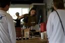 A barista makes a cup of coffee during a training session in Encuentro Cafe in this undated photo.