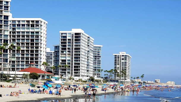 People on the beach in Coronado on July 12, 2020.