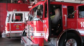 San Diego Fire and Rescue Department Truck 10 sits in a fire station garage. 