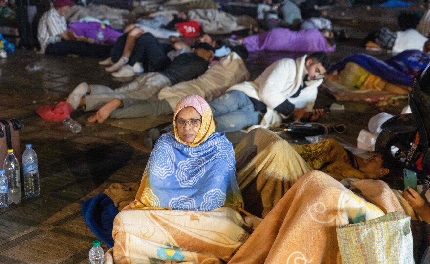 Residents take shelter outside at a square following an earthquake in Marrakesh on Saturday.