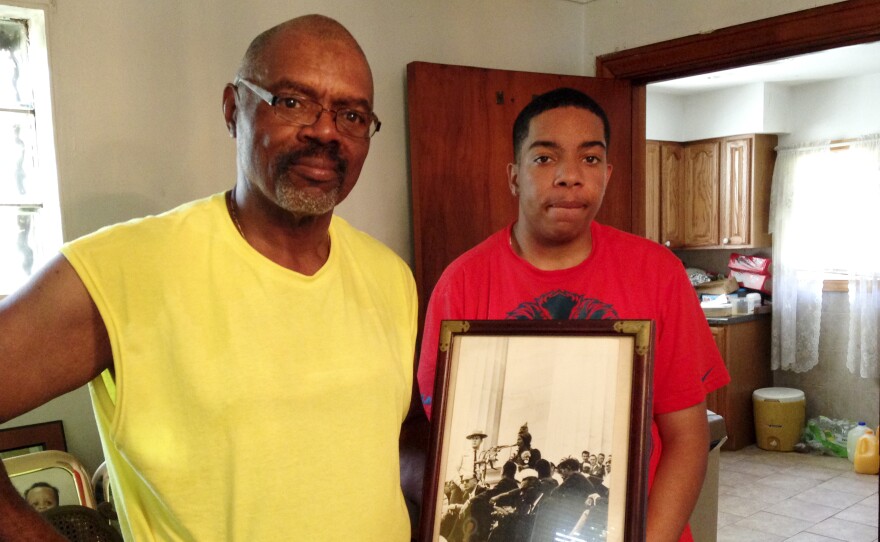 Steven Clark says even though he's learned plenty from his teachers at Urban Prep, his father, Allen, is his biggest role model. The family has a personal connection to civil rights history: Allen holds a picture that shows his cousin, gospel singer Mahalia Jackson, singing at the Lincoln Memorial during the 1963 March on Washington.