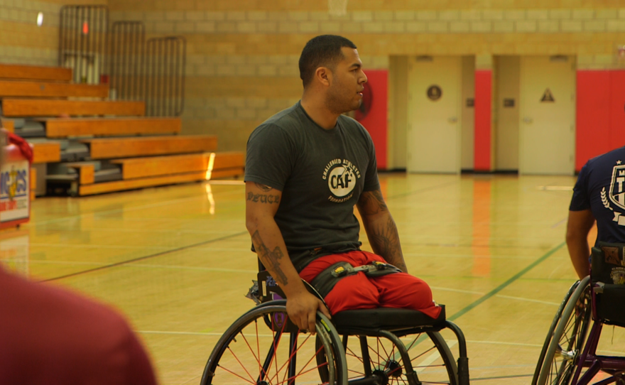 San Diego Marine veteran Jorge Salazar, who became a double amputee after stepping on an IED in Afghanistan in August 2012, practices wheelchair basketball at the Paralympic trials at Camp Pendleton, March 5, 2015.