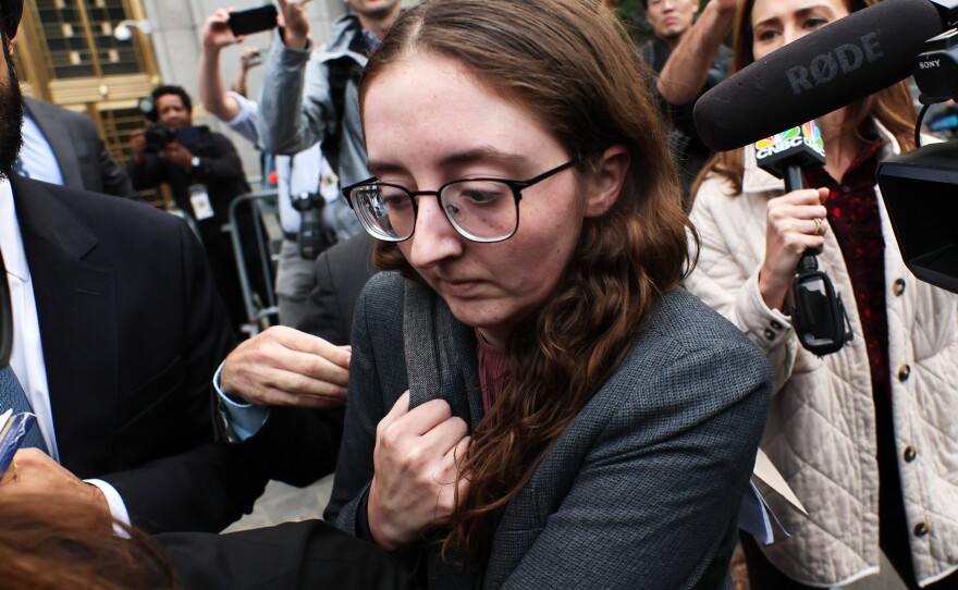 Caroline Ellison, the former head of Alameda Research, leaves Manhattan Federal Court in New York City after testifying during Bankman-Fried's trial on Oct. 10, 2023. Ellison was among the prosecutors' witnesses who testified that Bankman-Fried had directed them to commit crimes.