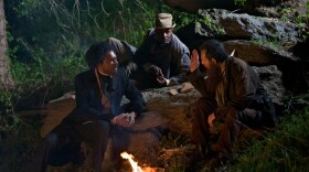 John Brown (T. Ryder Smith on right) tries to persuade Frederick Douglass (Richard Brooks on left) to join his planned assault on Harper's Ferry as Shields Green (Thomas Coleman in the center) looks on.