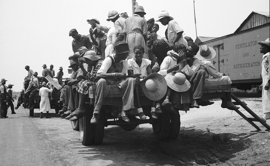 An undated photo shows peach pickers being driven to the orchards in Muscella, Ga. Black labor was essential for the success of the peach crop, even if African-Americans were rarely credited for the importance of their work.