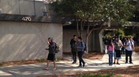 Students are pictured outside of the building at Southwestern College that is being cordoned off, Oct. 16, 2014.