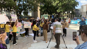 Arts community members rally at Civic Center Plaza before the City Hall budget review committee meeting, May 27, 2026.