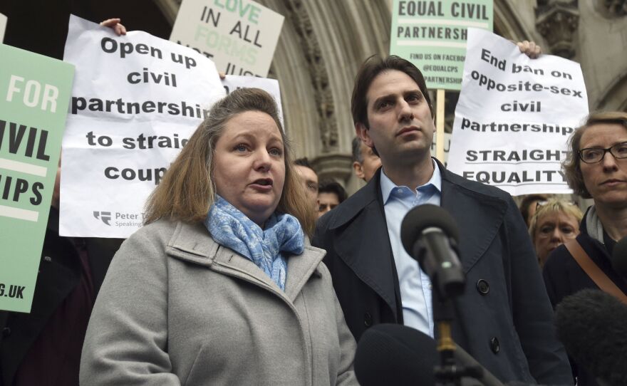 Rebecca Steinfeld, left, and Charles Keidan, shown outside London's Royal Courts of Justice in 2017, wanted their relationship recognized in law without the "patriarchal baggage" of marriage. They said they faced discrimination because only same-sex couples were eligible for civil partnerships.
