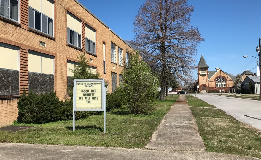 Outside Bennett Elementary School in Cairo, a sign reads "Goodbye Bennett. We will miss you." Two schools in town recently closed.