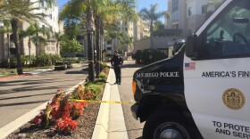 San Diego police officers work at a University City apartment complex after a shooting, April 30, 2017.