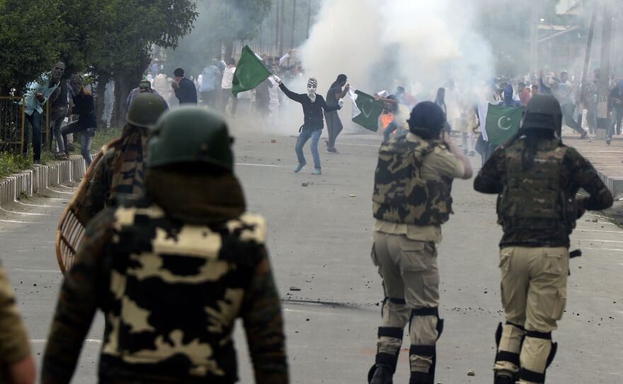 Indian government forces clash with Kashmiri protesters after Eid prayers in Srinagar on June 26, 2017. The region has seen decades of violence since an armed insurgency began fighting India's rule.