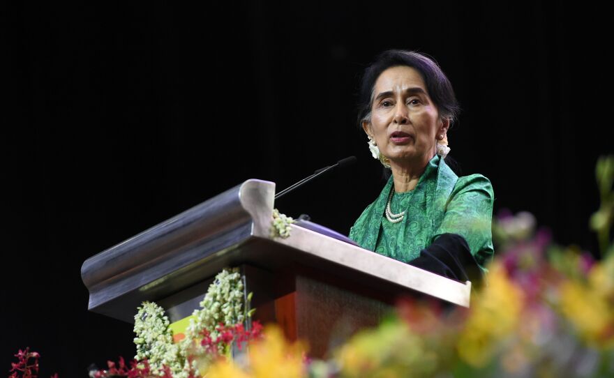 Nobel laureate Aung San Suu Kyi (shown here in December 2016) faces international pressure to address the Rohingya crisis.