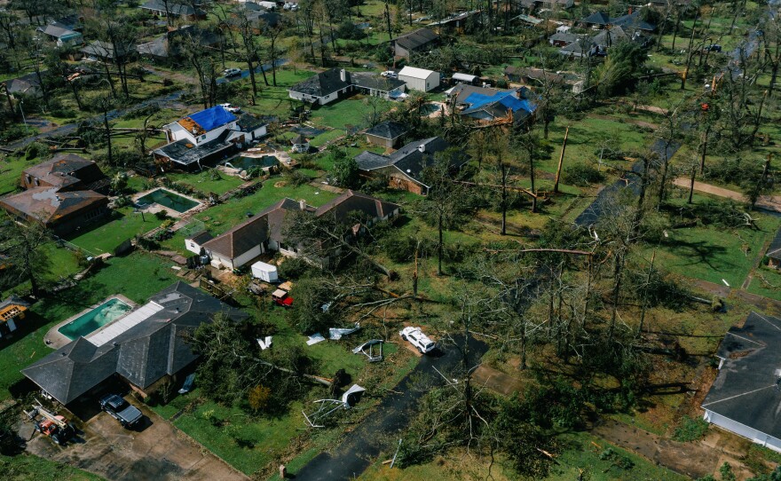 An aerial view of Lake Charles, La., shows damage to houses last week after Hurricane Laura, one of the most powerful storms ever to hit Louisiana, tore through the area.