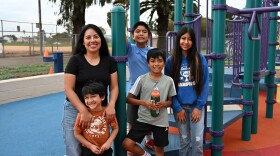 Stephanie Romero stands with her kids, Leonardo, 5, Santiago, 7, Valentin, 9, and Isabella, 12 at the City of San Diego's Dolores Magdaleno Memorial Recreation Center on Tuesday, Dec. 30, 2026.