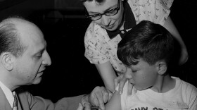 Boy receiving polio vaccine. (undated photo)